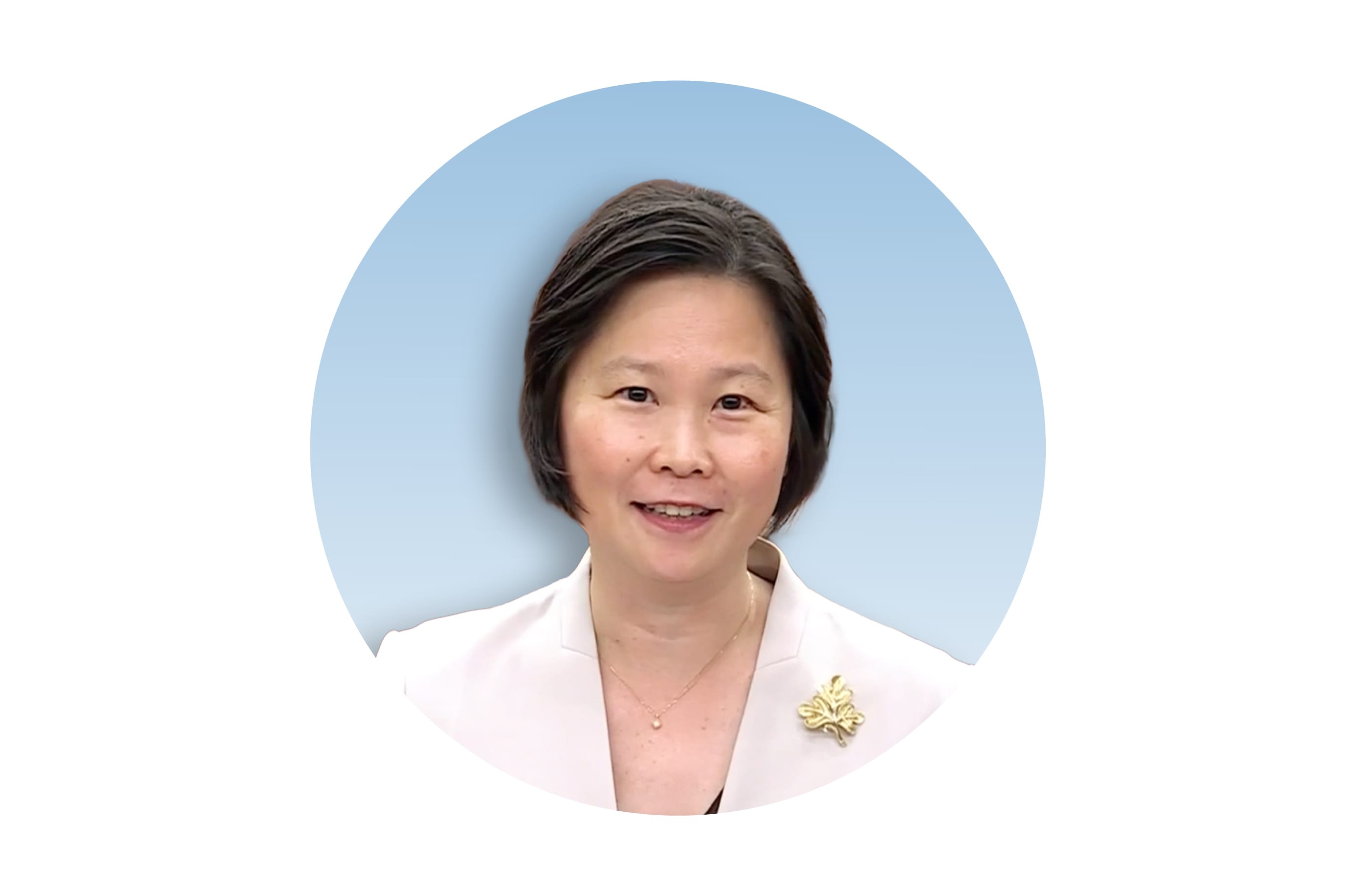 A portrait of Ms Gan Siow Huang in white blazer in the Parliament
